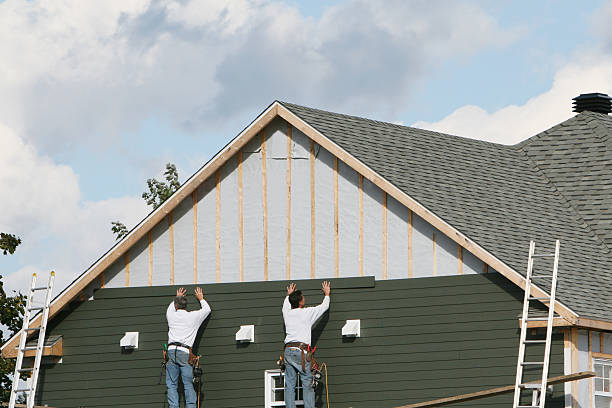 Professional Siding Contractor technician working in Lilly, PA